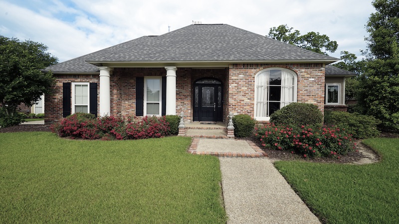 brick house with replacement windows