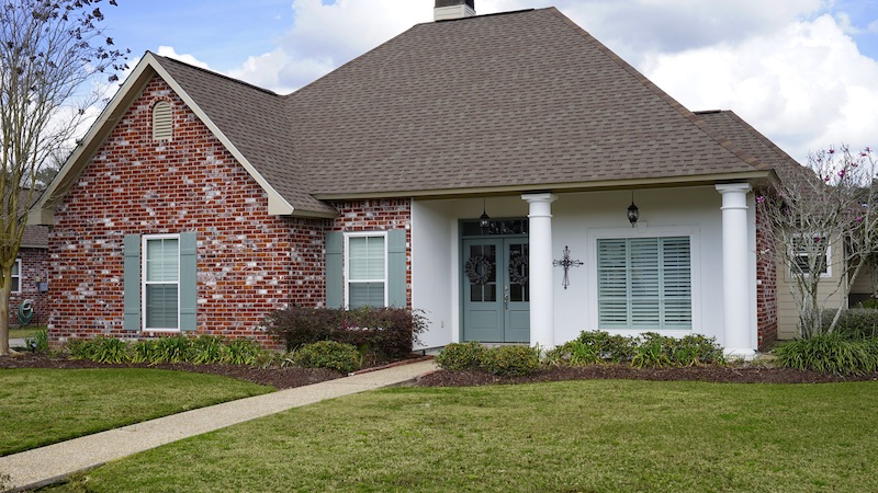 brick house with replacement windows