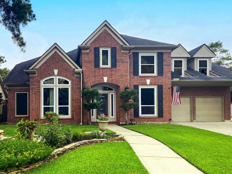 Two-story brick home exterior
