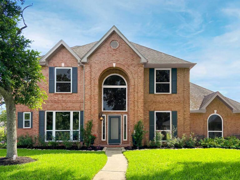 Two-story brick home exterior